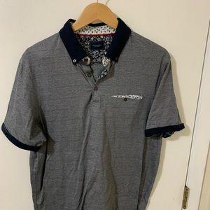 Seven Diamonds polo shirt.